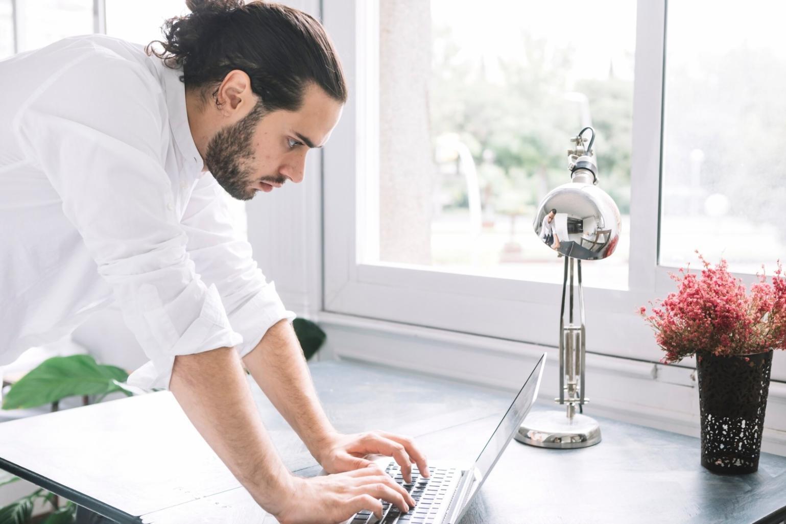 Professional collaboration meeting with financial documents and analysis charts