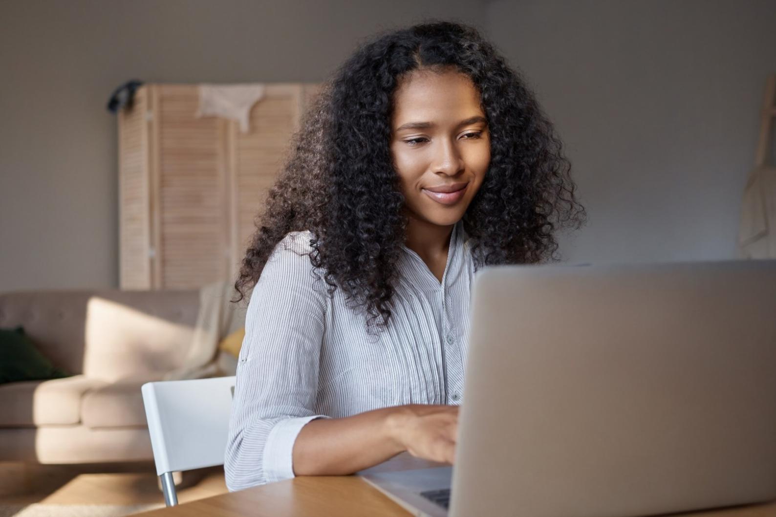 Students engaged in collaborative financial analysis session with charts and documents