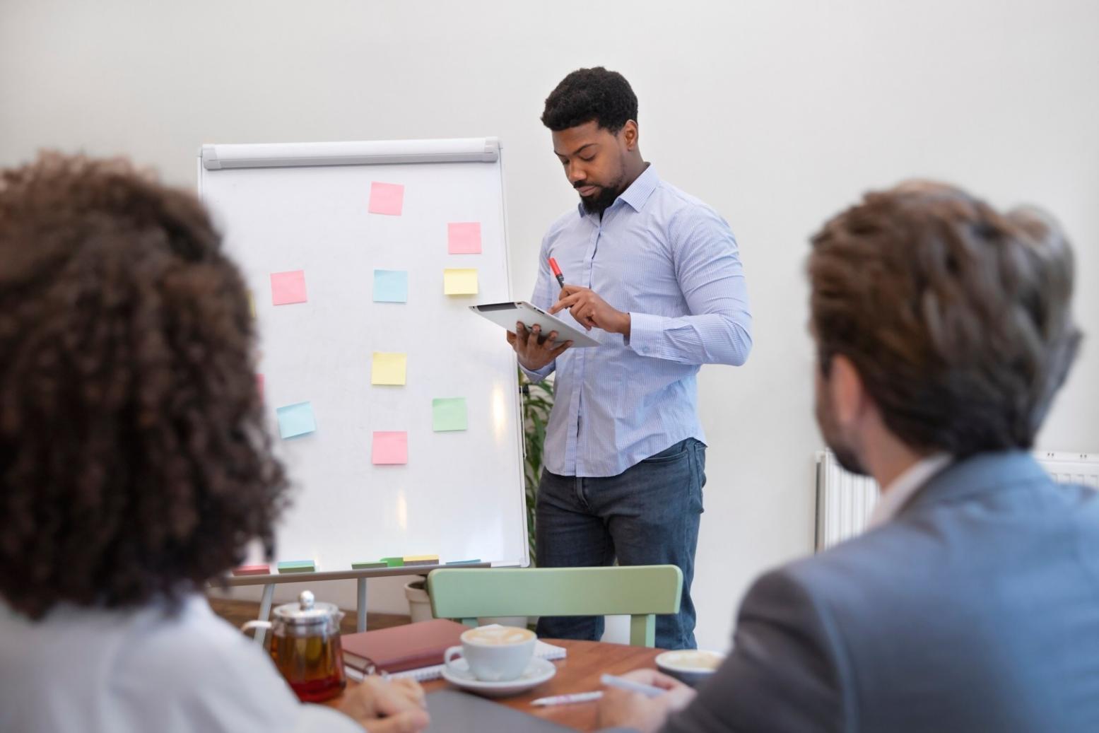 Business professional reviewing comparative financial analysis reports